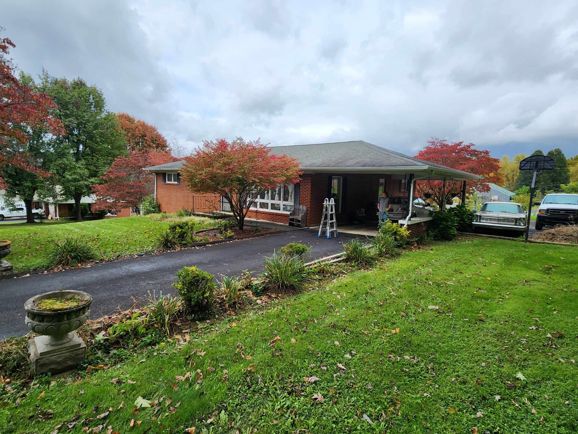 Residence Roofing & Restoration Transforms Home with Dark Bronze Gutters and Gutter Guards in Erwin, TN. Thumbnail